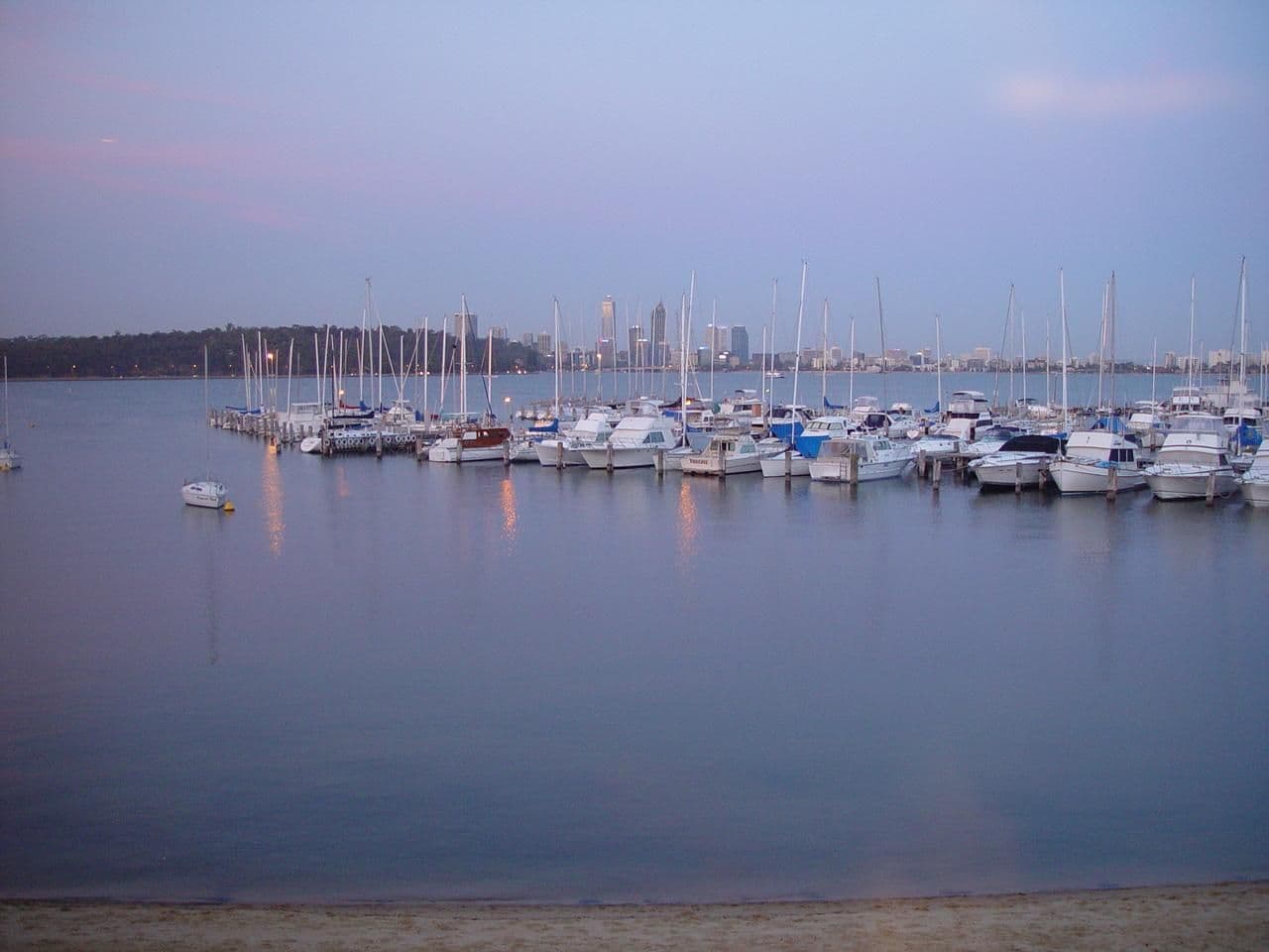 Sailboats moored at the Royal Perth Yacht Club