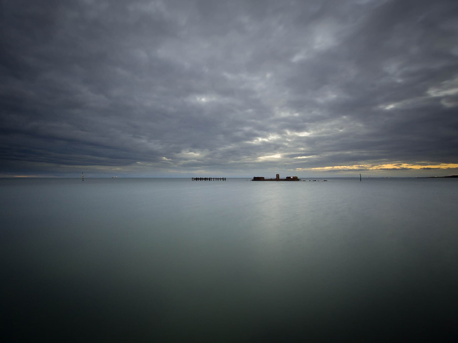 The scuttled HMVS Cerberus breakwater at dusk in Half Moon Bay