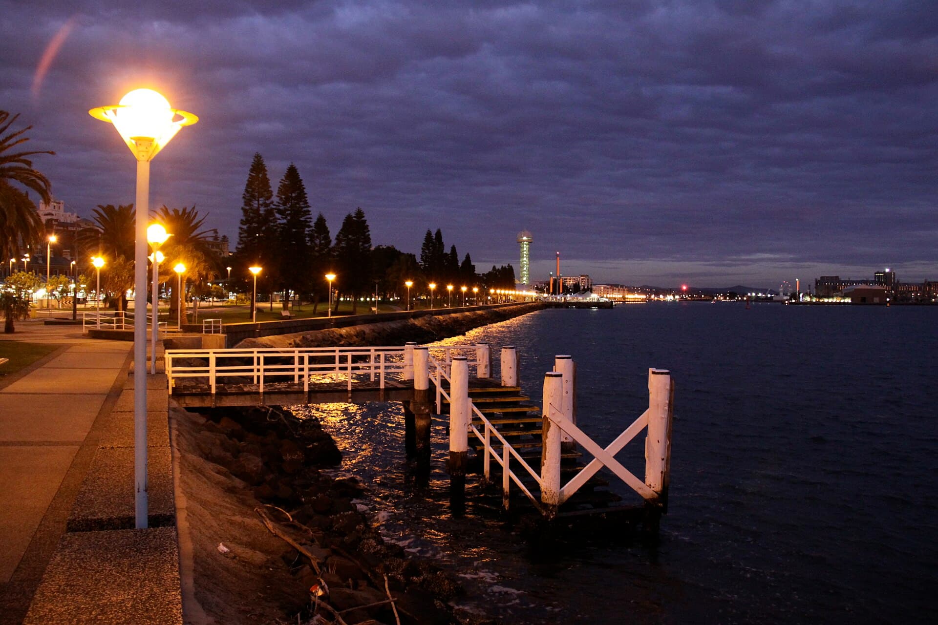 Jetty and foreshore promenade on Newcastle Harbour at dusk