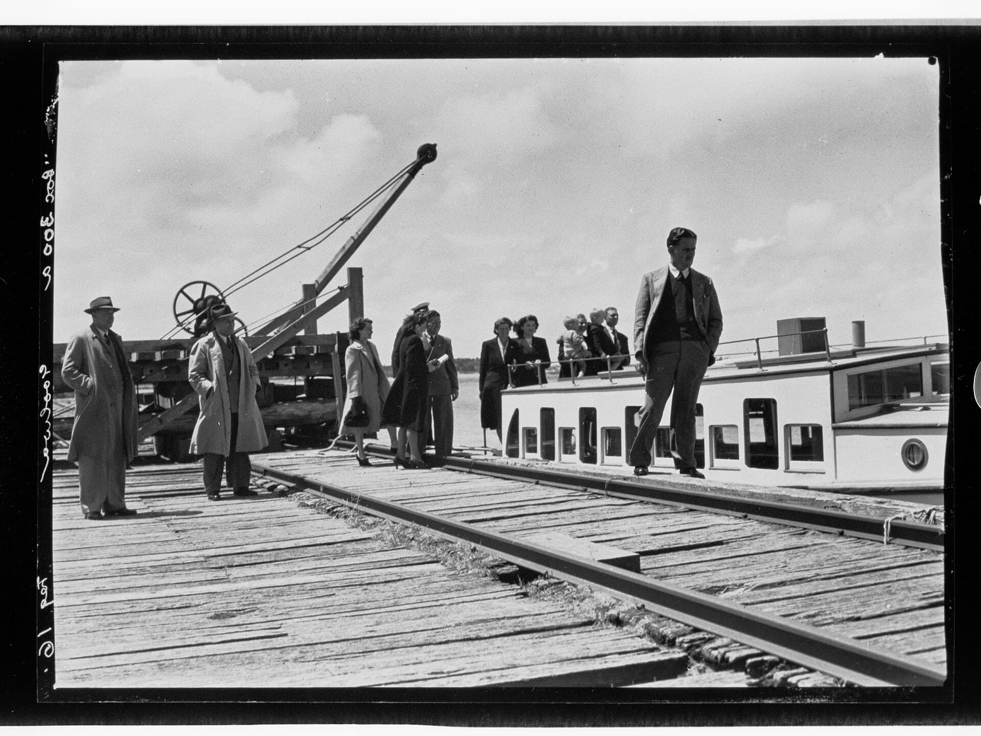 People boarding a boat at Goolwa pier on the River Murray