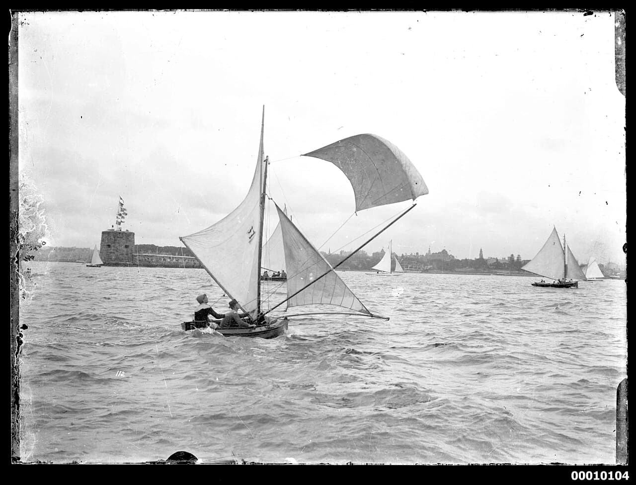 10 footer sailing near Fort Denison, Sydney Harbour